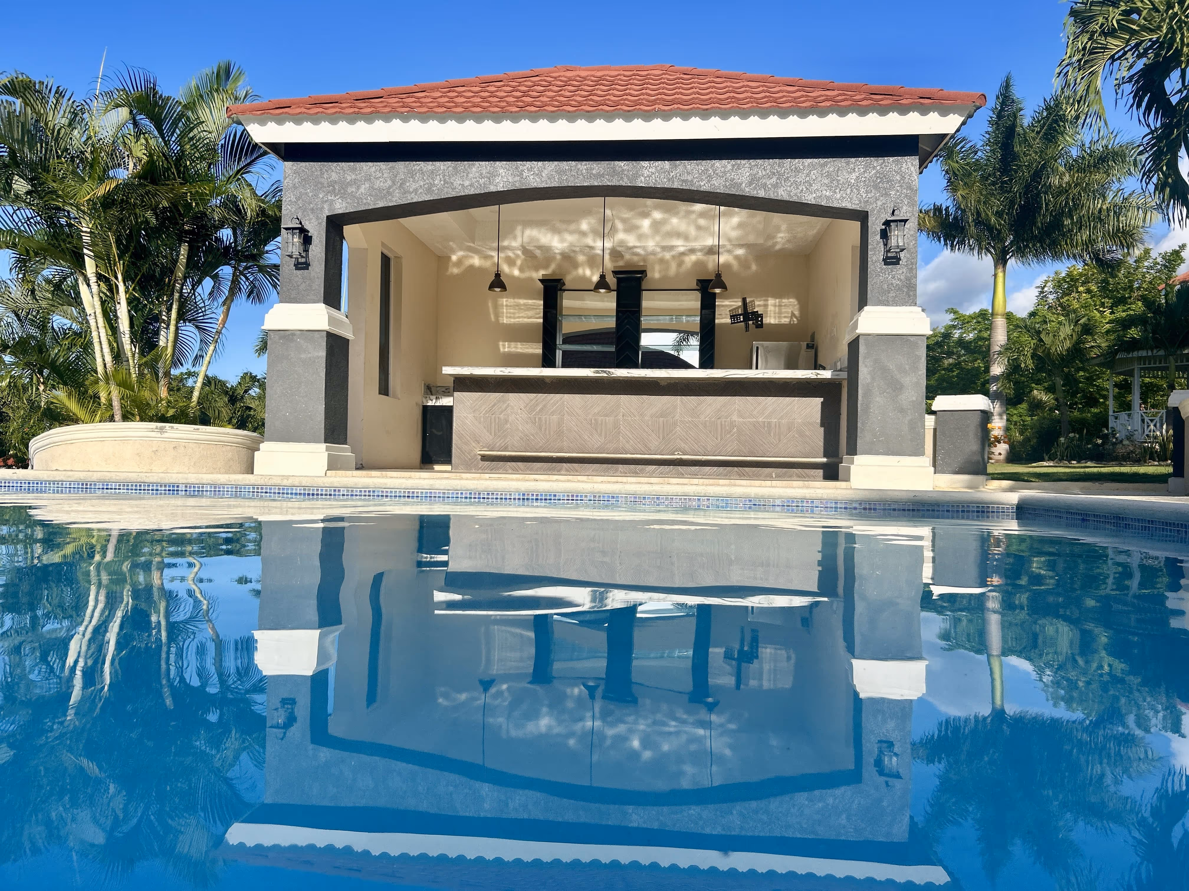 Soon Come Villa bar by the pool